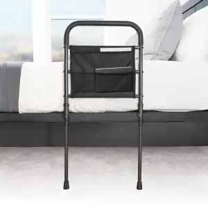Stander Wonder Stable Rail for mobility support in bedroom.