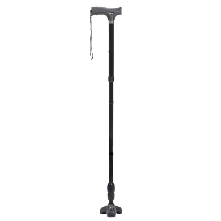 Adjustable walking cane with ergonomic handle and wrist strap for support.